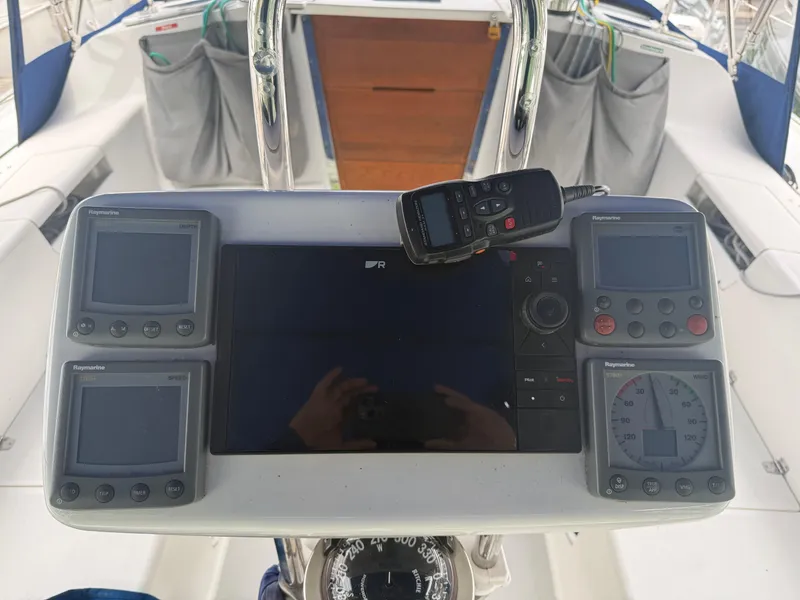 Slide: The Image of Control panel of a 2001 Catalina 42 MkII sailboat with navigation instruments. - 20