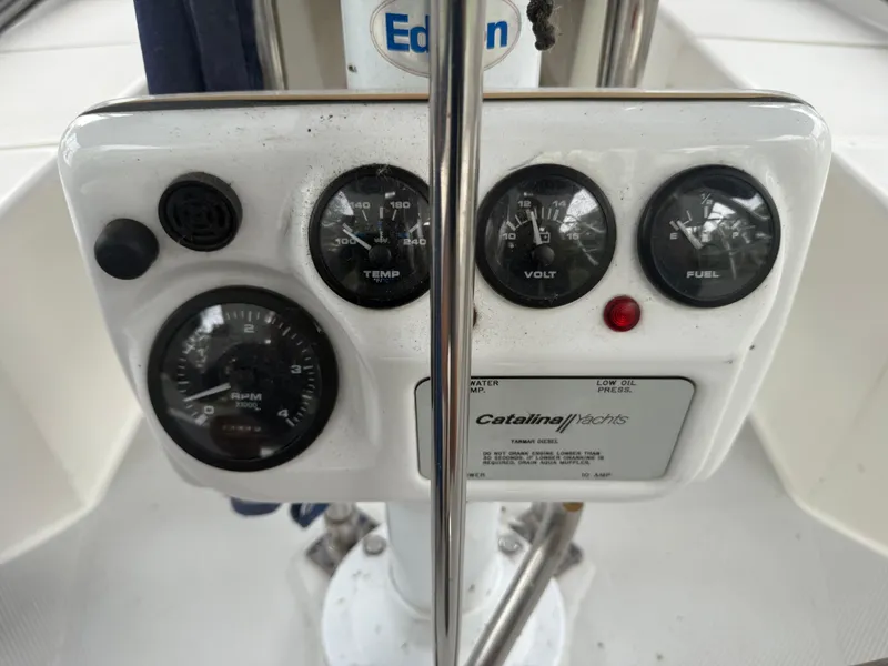 Slide: The Image of Control panel of a 2001 Catalina 42 MkII sailboat with gauges and indicators. - 22