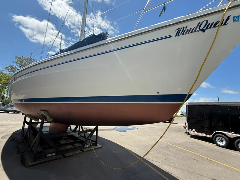 Slide: The Image of 2001 Catalina 42 MkII sailboat on trailer, clear sky background. - 42