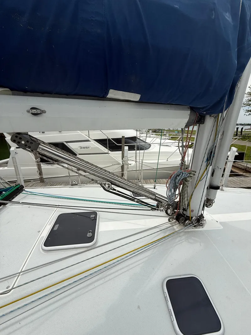 Slide: The Image of 2001 Catalina 42 MkII sailboat deck with rigging and blue sail cover. - 8