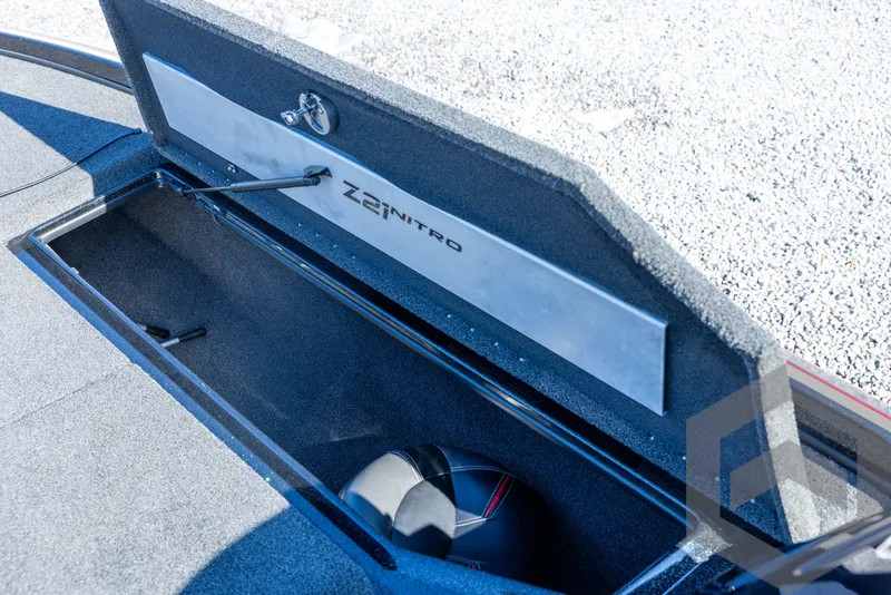 Slide: The Image of 2017 Nitro Z21 Z-PRO storage compartment with open lid, showcasing interior space. - 36