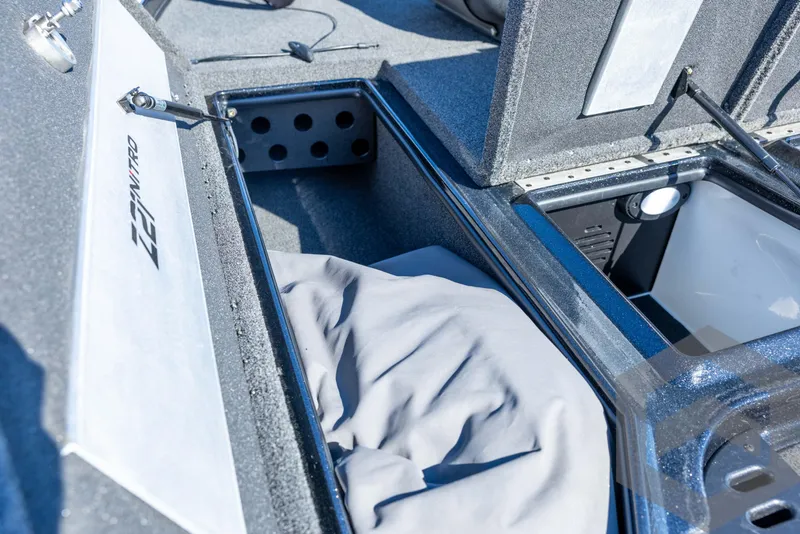 Slide: The Image of 2017 Nitro Z21 Z-PRO boat storage compartments with open lids and interior view. - 37