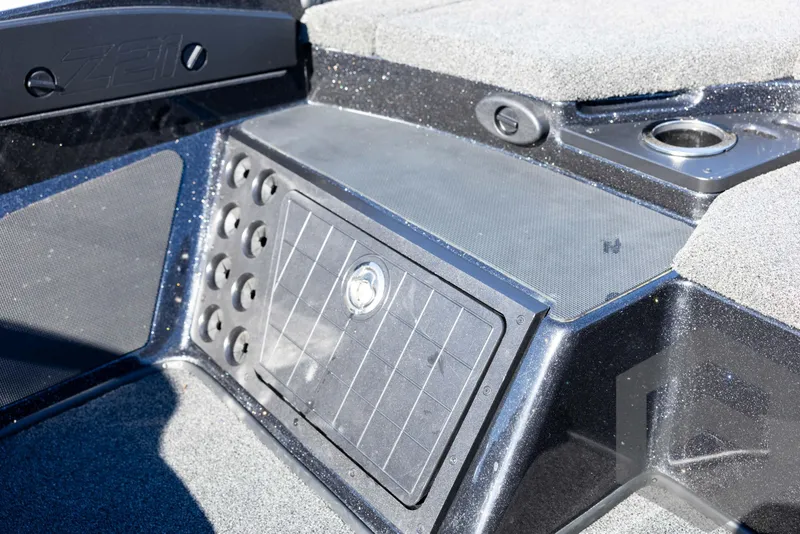 Slide: The Image of 2017 Nitro Z21 Z-PRO boat interior with storage compartment and cup holder. - 43