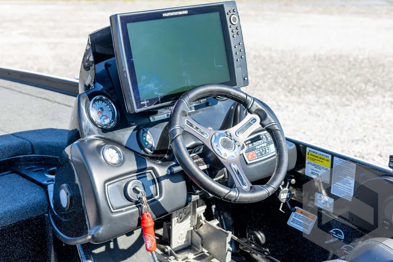 Slide: The Image of 2017 Nitro Z21 Z-PRO boat dashboard with steering wheel and electronic display. - 44