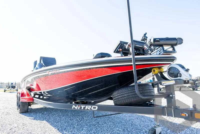 Slide: The Image of 2017 Nitro Z21 Z-PRO Package boat on trailer, red and black design. - 9
