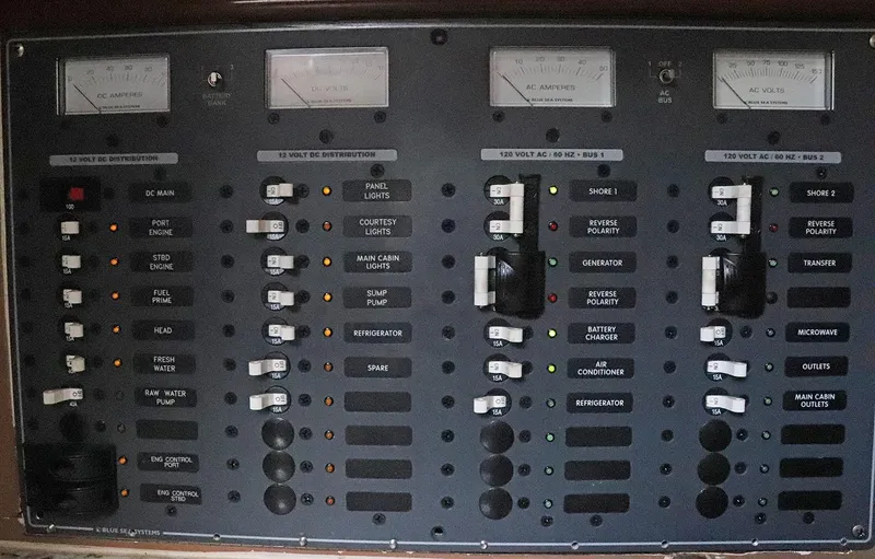 Slide: The Image of Electrical control panel on a 1997 Gamefisherman 34 Express boat. - 23