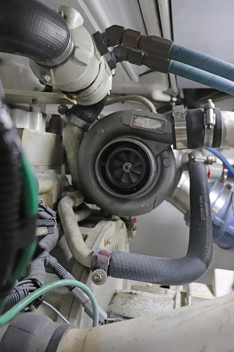 Slide: The Image of Engine component of a 1997 Gamefisherman 34 Express boat. - 41