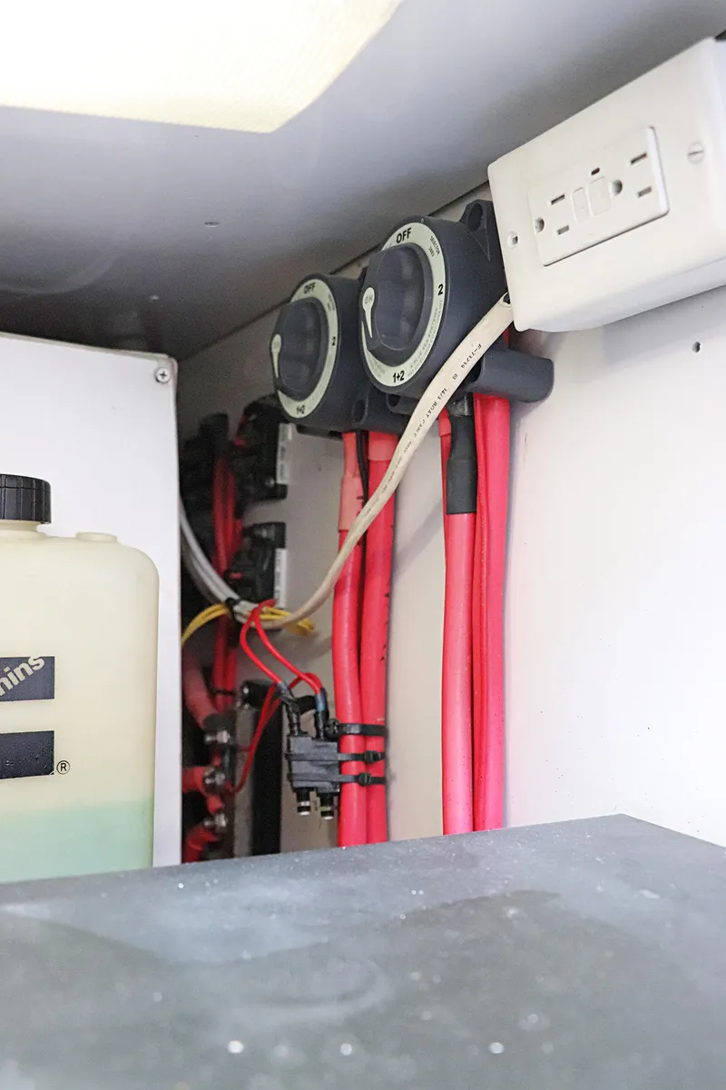 Slide: The Image of Electrical wiring and components inside a 1997 Gamefisherman 34 Express boat. - 44