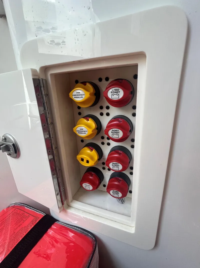 Slide: The Image of Control panel with switches on a 2018 Blackwater 43 boat. - 18