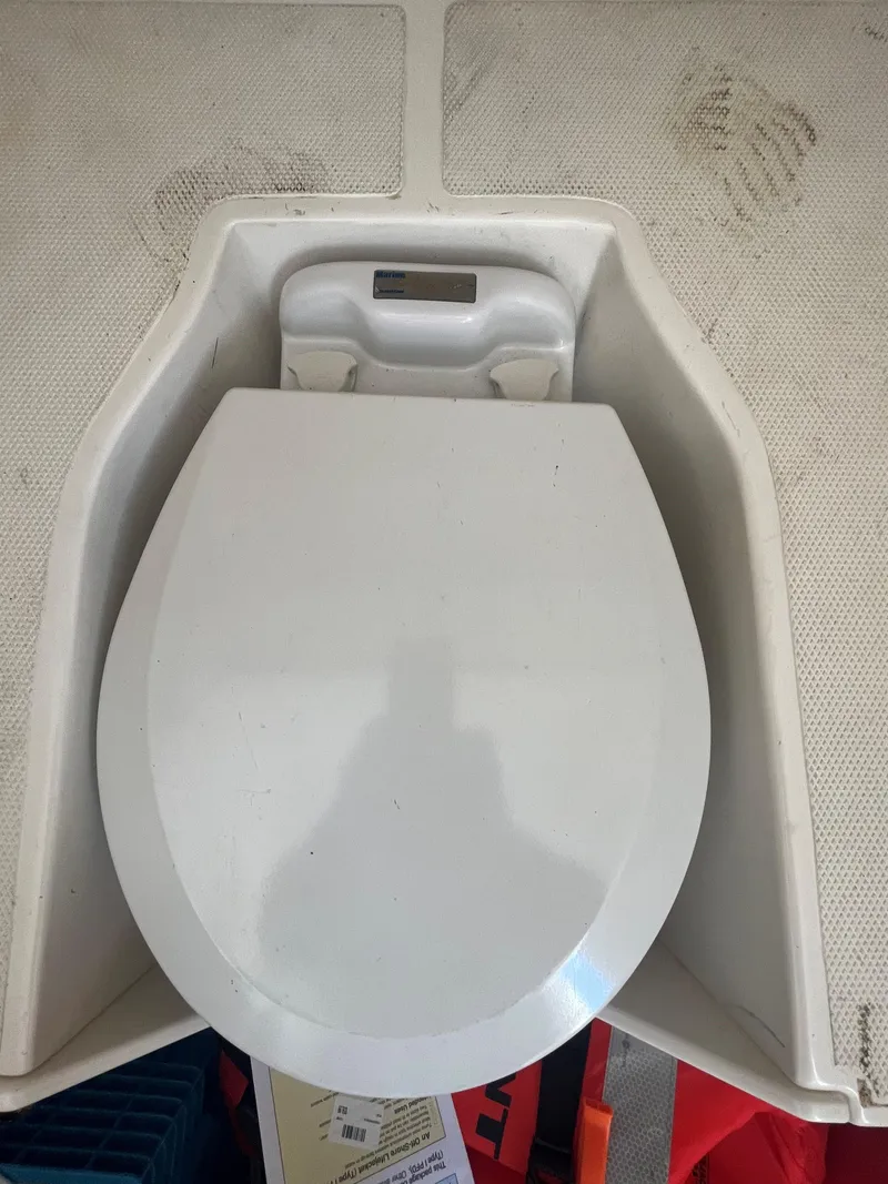 Slide: The Image of White toilet seat on Blackwater 43 boat, 2018 model. - 23