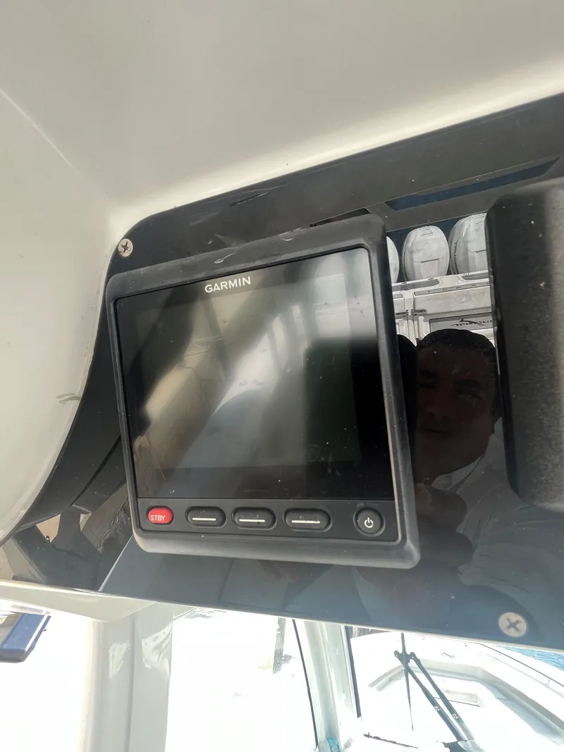 Slide: The Image of Garmin display on 2018 Blackwater 43 boat dashboard, showing reflection. - 28