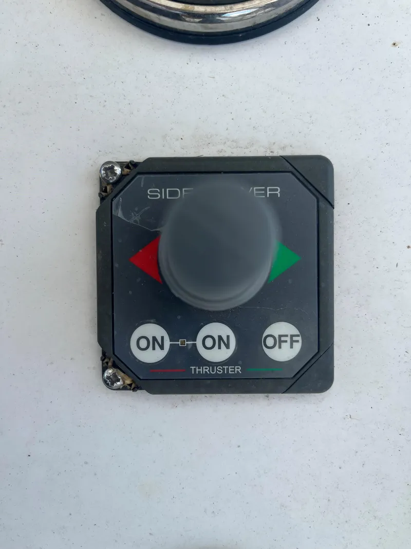 Slide: The Image of Control panel for Blackwater 43 boat thruster, featuring on/off buttons and directional indicators. - 42