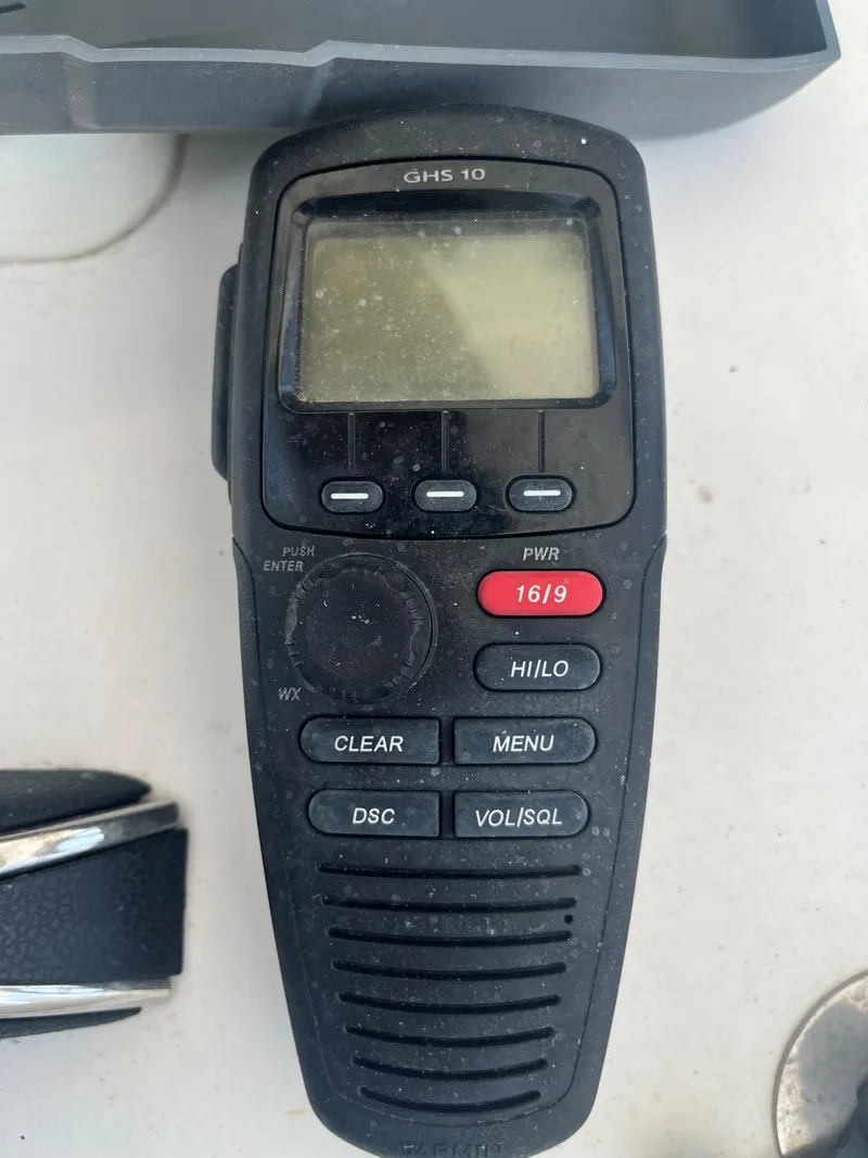 Slide: The Image of Blackwater 43 handheld radio, model GHS 10, with buttons and display, 2018. - 43