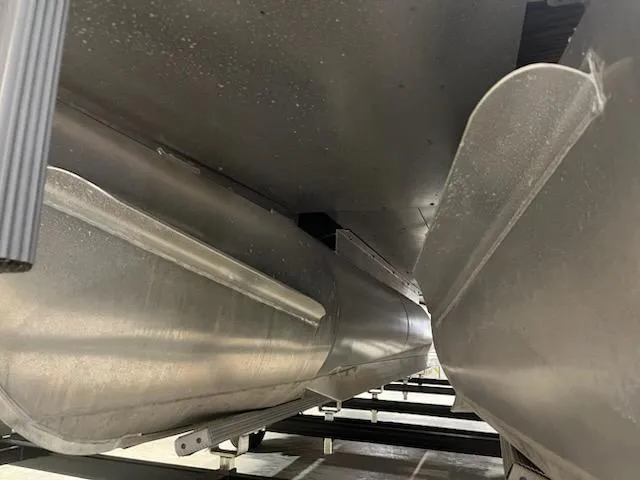 Slide: The Image of Underneath view of a 2022 Sweetwater 2286SBCX pontoon boat, showcasing its aluminum pontoons. - 6