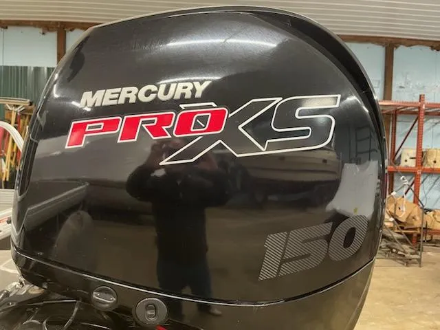 Slide: The Image of Mercury Pro XS 150 outboard motor on 2022 Sweetwater 2286SBCX boat. - 7