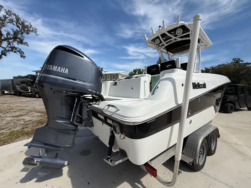 Slide: The Image of 2021 Wellcraft 242 Offshore boat with Yamaha engine on trailer. - 5