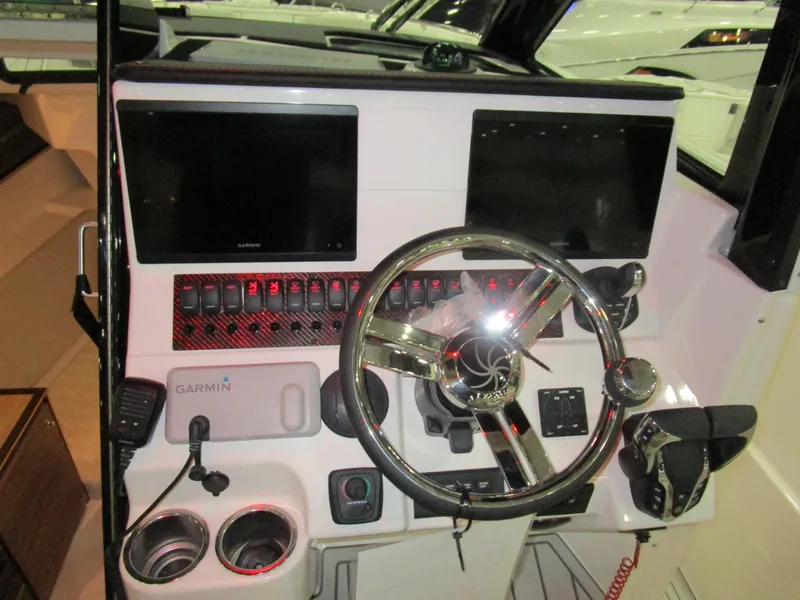 Slide: The Image of Interior of 2025 Solara S-310 CW boat with modern helm and seating. - 15