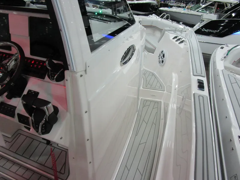 Slide: The Image of Interior of 2025 Solara S-310 CW boat with sleek seating and modern design. - 29