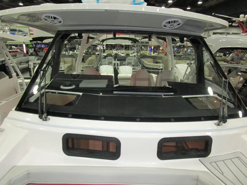 Slide: The Image of 2025 Solara S-310 CW boat cockpit with modern controls and navigation displays. - 32