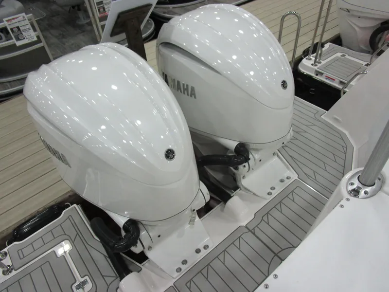 Slide: The Image of Compact kitchen area in 2025 Solara S-310 CW boat with microwave and mini fridge. - 35