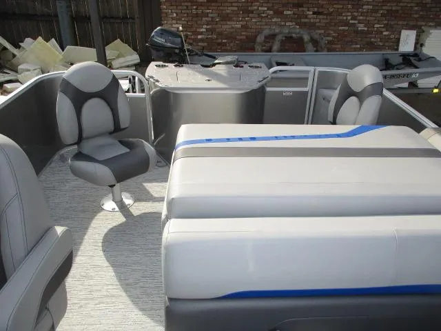 Slide: The Image of 2025 Bennington 23SXSAPG STERN FISH boat interior with seating and helm. - 3