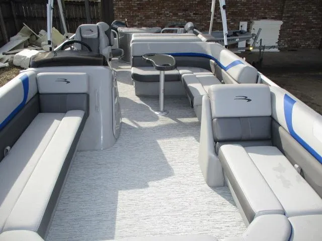 Slide: The Image of 2025 Bennington 23SXSAPG STERN FISH pontoon boat with spacious seating and modern design. - 4
