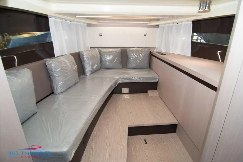 Slide: The Image of 2024 Invictus GT320S interior with modern seating and sleek design. - 43