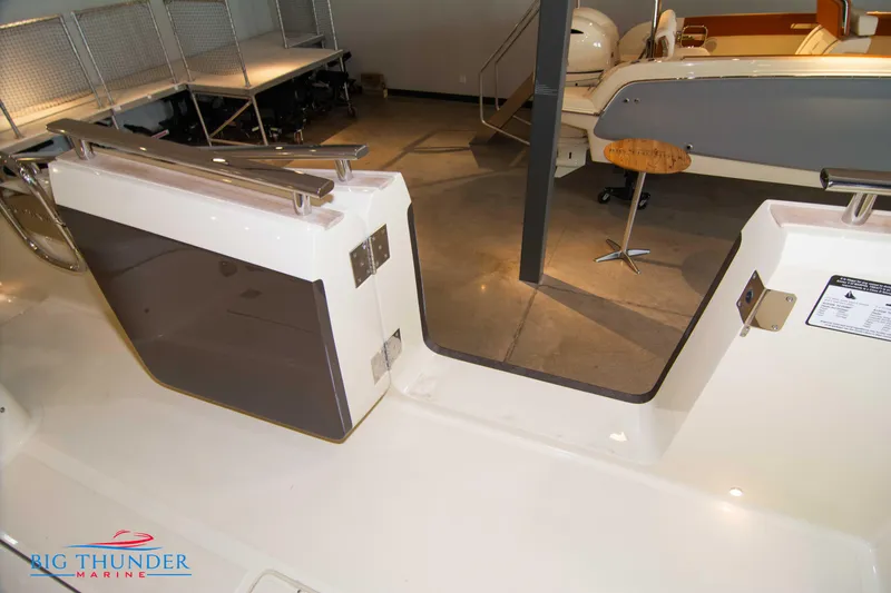 Slide: The Image of 2024 Invictus GT320S boat interior with sleek design and modern features. - 5