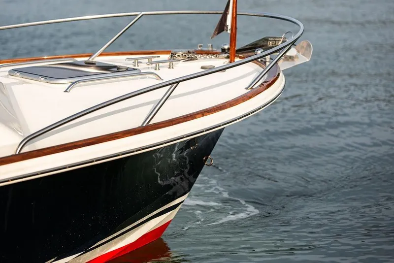 Slide: The Image of 2021 Hunt Yachts Harrier 26 bow on water, showcasing sleek design and craftsmanship. - 15