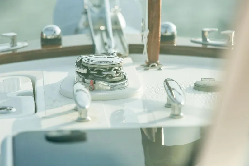 Slide: The Image of 2021 Hunt Yachts Harrier 26 deck with anchor chain and cleats. - 20