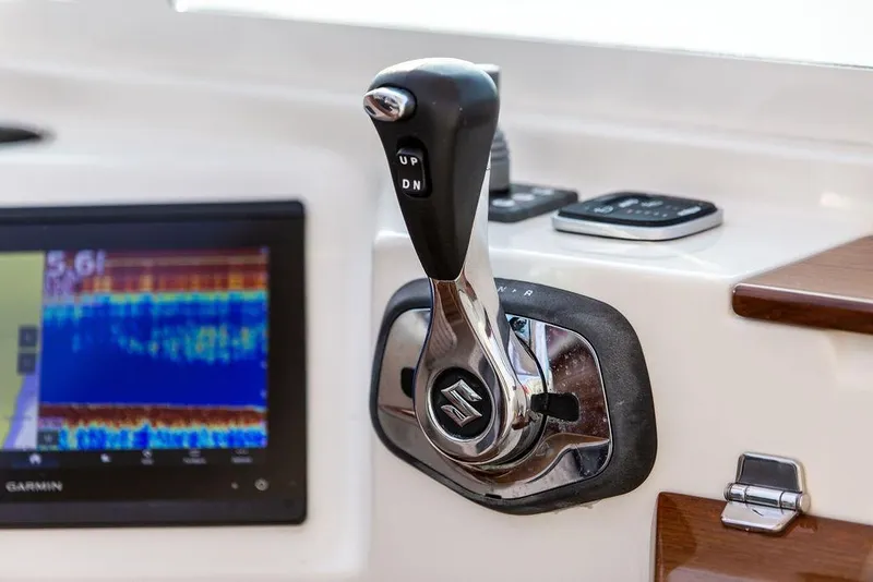 Slide: The Image of Throttle control and display on 2021 Hunt Yachts Harrier 26 boat dashboard. - 24