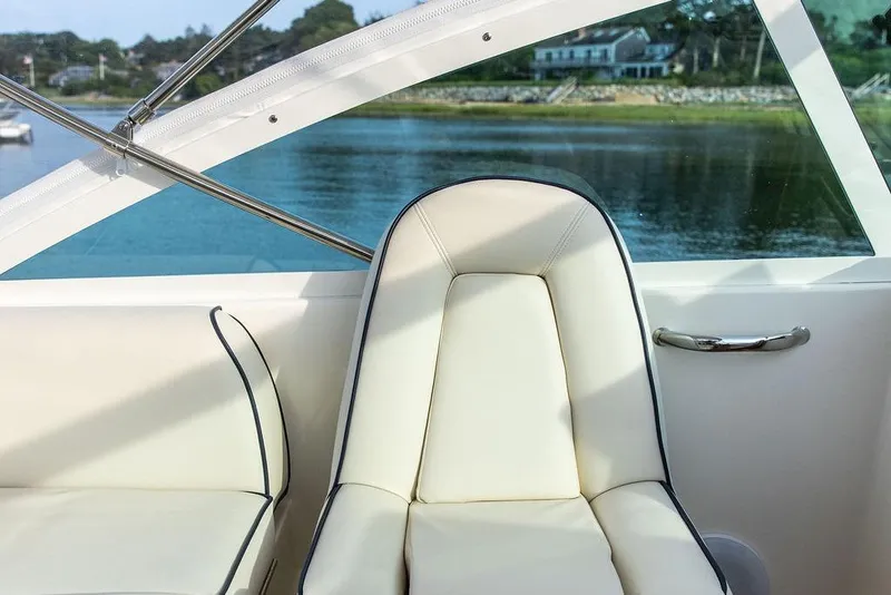 Slide: The Image of Luxurious seating on 2021 Hunt Yachts Harrier 26, with scenic water view. - 44
