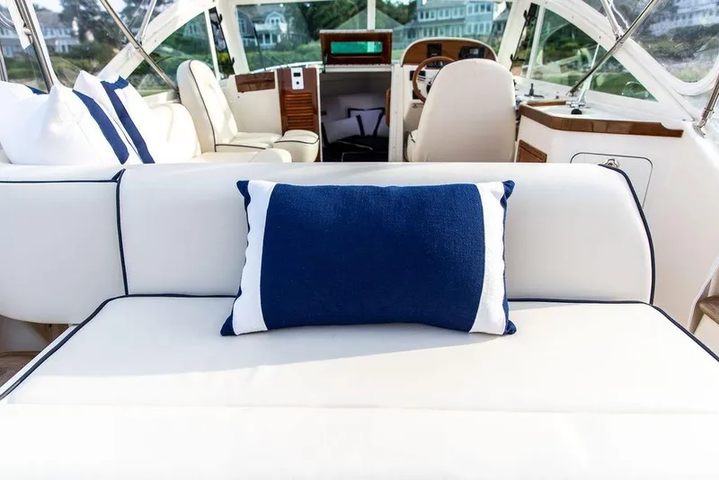 Slide: The Image of Luxurious interior of 2021 Hunt Yachts Harrier 26 with elegant seating and nautical decor. - 46
