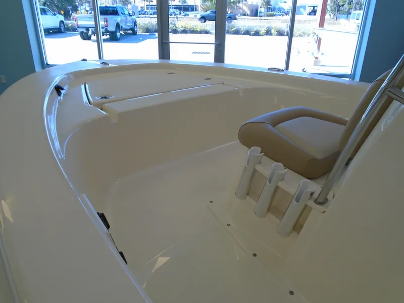 Slide: The Image of 2025 Scout 177 Sport boat interior with seating and rod holders. - 6