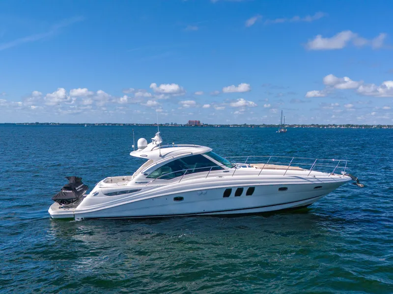 Slide: The Image of 2010 Sea Ray 500 Sundancer yacht cruising on a sunny day. - 2