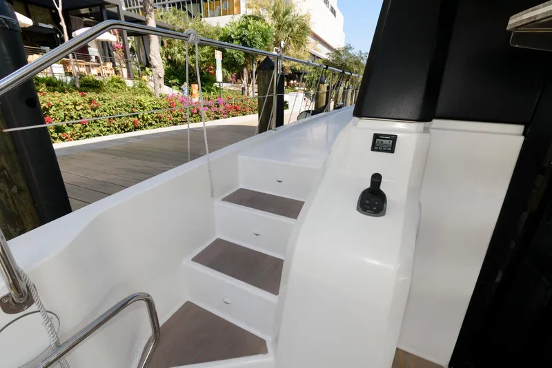 Slide: The Image of Staircase on 2022 Fountaine Pajot MY6 yacht, featuring sleek design and modern railing. - 23