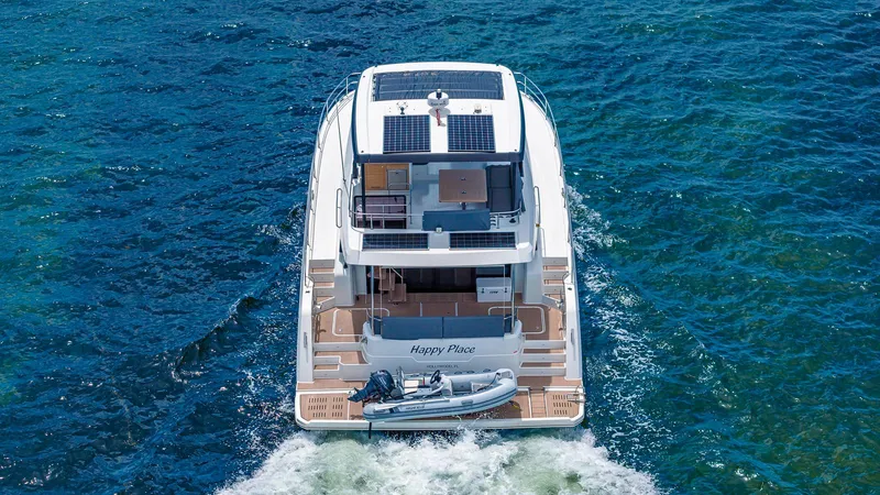 Slide: The Image of 2022 Fountaine Pajot MY6 yacht cruising on blue ocean waters. - 3