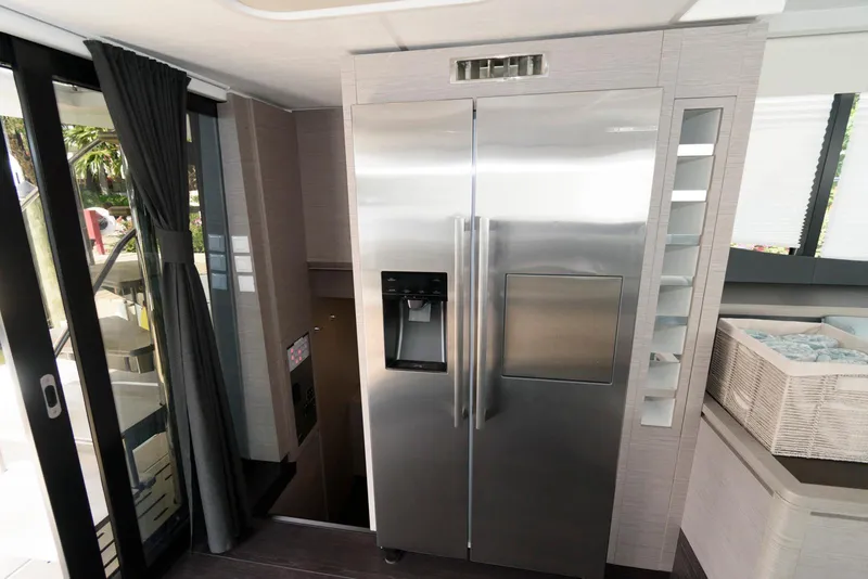 Slide: The Image of Modern kitchen interior of 2022 Fountaine Pajot MY6 yacht with stainless steel appliances. - 37