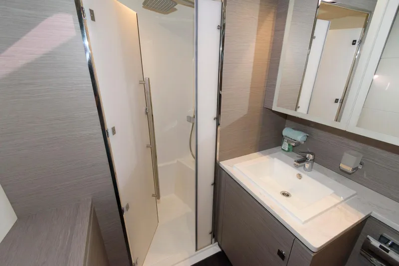 Slide: The Image of Modern bathroom in 2022 Fountaine Pajot MY6 yacht with shower and sink. - 41