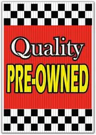 Slide: The Image of Quality pre-owned sign with checkered border, promoting Tahoe 1950 model, year 2023. - 5