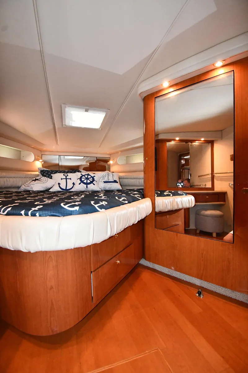 Slide: The Image of Luxurious cabin interior of 1998 Sea Ray 500 Sundancer yacht with nautical decor. - 33