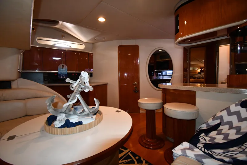 Slide: The Image of Luxurious interior of 1998 Sea Ray 500 Sundancer yacht with elegant decor and seating. - 43