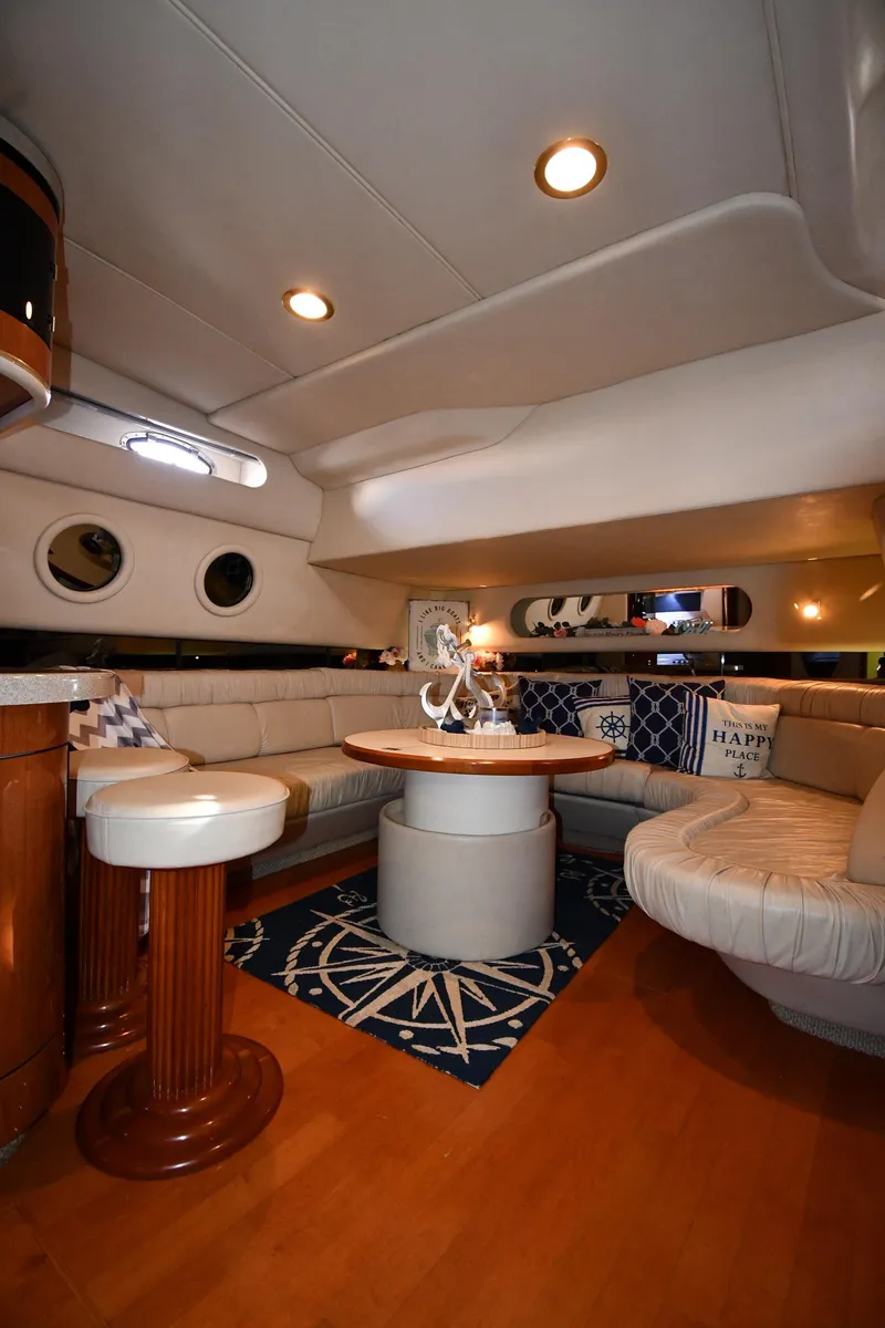 Slide: The Image of Luxurious interior of 1998 Sea Ray 500 Sundancer yacht with elegant seating and decor. - 45