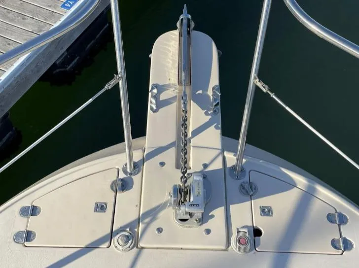 Slide: The Image of Bow of 2006 Albin 28 Tournament Express with anchor chain and deck fittings. - 31