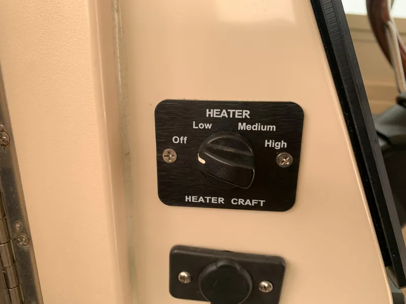 Slide: The Image of Heater control panel on 2006 Albin 28 Tournament Express boat. - 49
