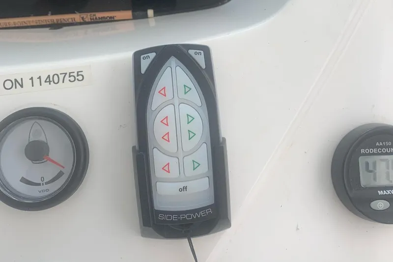 Slide: The Image of Control panel of a 2003 Sunseeker Predator 62 yacht with Side-Power remote. - 15