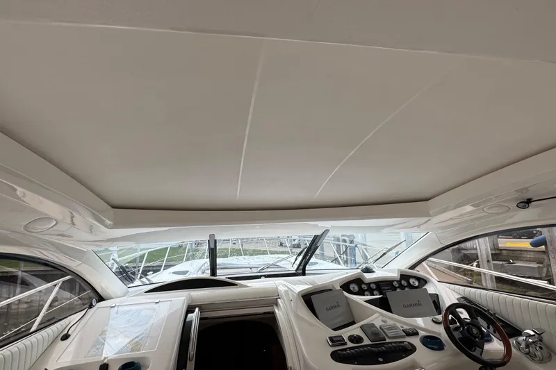 Slide: The Image of Interior view of 2003 Sunseeker Predator 62 yacht cockpit with navigation equipment. - 23