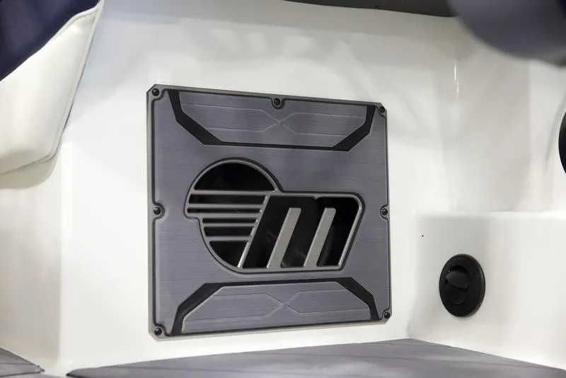 Slide: The Image of 2025 Malibu 26 LSV boat interior detail with sleek design elements. - 15