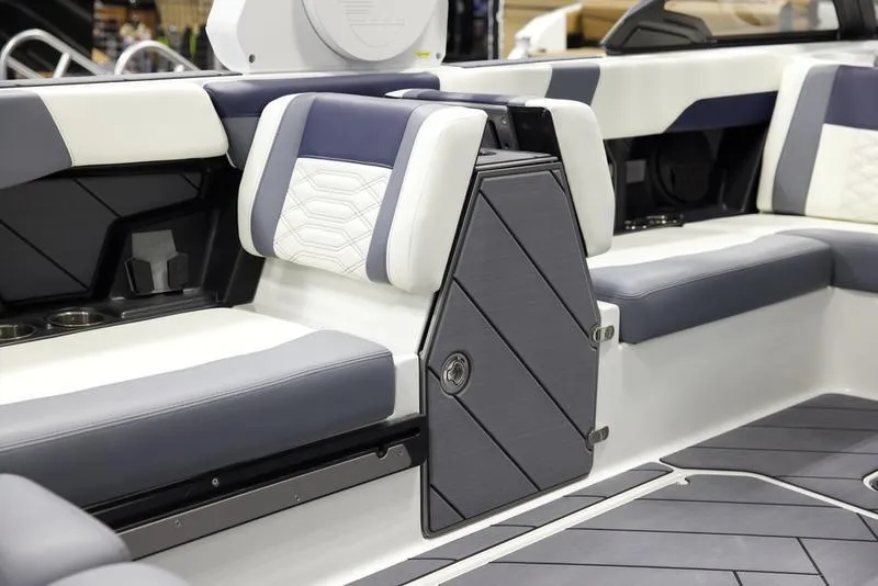Slide: The Image of 2025 Malibu 26 LSV boat interior with sleek seating and modern design. - 3