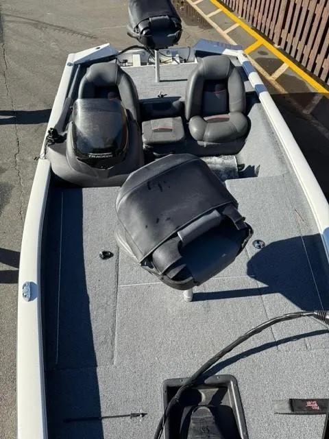 Slide: The Image of 2022 Tracker PRO175TE boat interior with seating and steering console. - 7